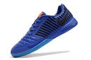 Chuteira Futsal Nike Lunar Gato II azul com detalhes pretos e solado claro