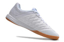 Chuteira Futsal Nike Lunar Gato II branca com solado marrom claro e logo preto